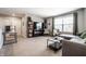 Cozy living room with comfortable seating, a TV, and a window view at 9407 Casey Rd, Pendleton, IN 46064