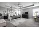Elegant main bedroom boasts a canopy bed, ceiling fan, neutral decor, and lots of natural light at 9407 Casey Rd, Pendleton, IN 46064