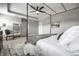Bright and airy main bedroom featuring neutral decor, a canopy bed, and a decorative rug at 9407 Casey Rd, Pendleton, IN 46064