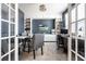 Stylish home office with built-in cabinets, a work desk, and plenty of natural light at 9407 Casey Rd, Pendleton, IN 46064