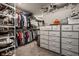 Spacious walk-in closet with ample shelving, drawers, and hanging space for organized storage at 9407 Casey Rd, Pendleton, IN 46064