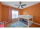 Cozy ' bedroom furnished with a bunk bed, colorful walls, and a playful rug, creating a fun space at 9858 Bryce Blvd, Pendleton, IN 46064