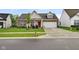 Charming single-Gathering home featuring a brick facade, well-manicured lawn, and an attached two-car garage at 9858 Bryce Blvd, Pendleton, IN 46064