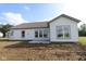 Home exterior view highlighting multiple windows and backyard at 10424 Oak Bend Blvd, Indianapolis, IN 46239