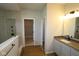 Clean bathroom featuring a glass shower, closet and granite countertop at 10424 Oak Bend Blvd, Indianapolis, IN 46239