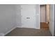 Bedroom with fresh paint, carpet, and a large closet perfect for storage at 10602 Maidenhair Dr, Indianapolis, IN 46239