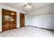 Spacious bedroom with carpet, two closets, and a door to another room, offering ample space and storage at 11544 Crestwood Ct, Indianapolis, IN 46239