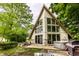 Back exterior features large windows, and a lounge space at 11544 Crestwood Ct, Indianapolis, IN 46239