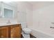 Bathroom featuring a vanity, toilet, and shower/tub combo at 12121 Driftstone Dr, Fishers, IN 46037