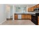 Bright eat-in kitchen with stainless dishwasher and plenty of countertop space, next to living spaces at 12121 Driftstone Dr, Fishers, IN 46037