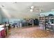 Large bonus room with a wood patterned floor and bright walls offers storage space at 1224 S Hunter Rd, Indianapolis, IN 46239