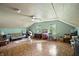 Spacious bonus room with plenty of natural light, wood floors, and space for activities at 1224 S Hunter Rd, Indianapolis, IN 46239