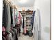 Walk-in closet featuring multiple shelves, hanging clothes, and other storage spaces at 1224 S Hunter Rd, Indianapolis, IN 46239