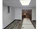 Spacious basement with new flooring, neutral walls, and bright lighting, perfect for recreation or storage at 1267 W 750 S, Trafalgar, IN 46181