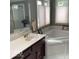 Bathroom features a soaking tub, walk-in shower, vanity with sink, and neutral accents at 1273 Helford Ln, Carmel, IN 46032