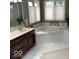 Bathroom features a soaking tub, walk-in shower, vanity with sink, and neutral accents at 1273 Helford Ln, Carmel, IN 46032