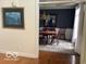 View of dining room with wood table and chairs, chandelier, and rug at 1273 Helford Ln, Carmel, IN 46032
