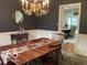 Spacious dining room with table, chairs, and kitchen access at 1273 Helford Ln, Carmel, IN 46032