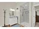 Bright bathroom featuring a glass-enclosed shower, and a modern vanity at 1377 Sedona Dr, Carmel, IN 46032