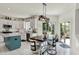 Bright kitchen with granite counters, stainless appliances, an island, an eat-in table, and access to the yard at 1377 Sedona Dr, Carmel, IN 46032