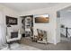 bedroom featuring a rocking chair, mounted television, and closet with built-ins at 1414 W Springhurst Blvd, Greenfield, IN 46140