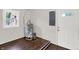 A utility room features a water heater, a window, and a door to the outside at 1418 W 5Th St, Anderson, IN 46016