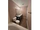 Bathroom with dual granite sinks, gray cabinets, tile floors and dark hardware at 14375 Leland Muse, Fishers, IN 46037