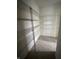 Walk-in pantry closet with tile flooring and wire shelving for ample storage at 14375 Leland Muse, Fishers, IN 46037