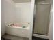 Bathroom with a large soaking tub and shower at 1503 Quinlan Ct, Indianapolis, IN 46217