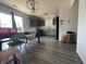 This home features a quaint kitchen with gray-green cabinets and gray flooring at 1503 Quinlan Ct, Indianapolis, IN 46217