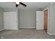 Spacious bedroom featuring carpet, neutral walls, closet and ceiling fan at 1504 Manhattan Ave, Indianapolis, IN 46241