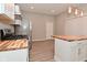 Bright, open kitchen featuring an island and stainless steel appliances at 1504 Manhattan Ave, Indianapolis, IN 46241