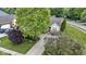 Lovely home showcasing professional landscaping, mature trees, and a long drive at 15098 Newburyport Dr, Fortville, IN 46040