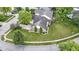 An aerial view of a beautifully landscaped home with a well-maintained lawn and mature trees at 15098 Newburyport Dr, Fortville, IN 46040