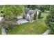 Charming home featuring a well-manicured lawn, brick accents, and a spacious driveway leading to an attached garage at 15098 Newburyport Dr, Fortville, IN 46040