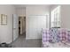 Bedroom with carpet, closet, and a large window for plenty of natural light at 15098 Newburyport Dr, Fortville, IN 46040