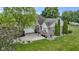 Charming home featuring a well-manicured lawn, brick accents, and a spacious driveway leading to an attached garage at 15098 Newburyport Dr, Fortville, IN 46040