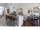 Open-concept kitchen features a breakfast bar, island, and dining area with modern appliances at 15098 Newburyport Dr, Fortville, IN 46040