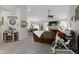 Open-concept living area with neutral tones, fireplace, and comfortable seating, offering a relaxing and inviting space at 15098 Newburyport Dr, Fortville, IN 46040