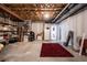 Unfinished basement with exposed ceiling and a small carpeted area at 1521 Midnight Pass, Brownsburg, IN 46112