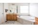 Bathroom with a vanity, a soaking tub, neutral paint, and a towel rack at 1521 Midnight Pass, Brownsburg, IN 46112