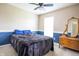 Bedroom featuring a bed, a vintage wooden dresser, and a ceiling fan at 1521 Midnight Pass, Brownsburg, IN 46112