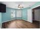 Cozy bedroom with new floors and a ceiling fan at 1702 Juniper Ln, Greenwood, IN 46143