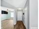 Inviting foyer with sleek flooring, leading to a bright and airy living space at 1702 Juniper Ln, Greenwood, IN 46143