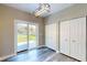 Dining room with sliding door to back yard, adjacent to bathroom at 1809 S H St, Elwood, IN 46036