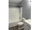 Clean, updated bathroom features a modern shower and bathtub combo with new toilet at 19236 Fox Chase Dr, Noblesville, IN 46062