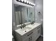 Bathroom featuring double sinks, quartz counters, and modern finishes at 19236 Fox Chase Dr, Noblesville, IN 46062