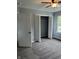 Bedroom with closet, new carpet, a ceiling fan, and a window offering natural light at 19236 Fox Chase Dr, Noblesville, IN 46062