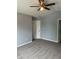 Spacious bedroom featuring neutral walls, plush carpet, and a decorative ceiling fan at 19236 Fox Chase Dr, Noblesville, IN 46062