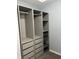 Walk-in closet with drawers, shelves, and hanging rods at 19236 Fox Chase Dr, Noblesville, IN 46062